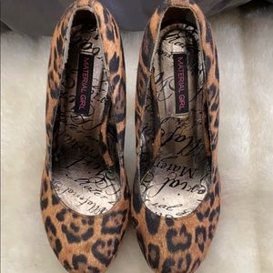 Leopard print trimmed red lacquer heels